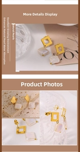 Macro detail of gold geometric earrings with square baroque natural pearls