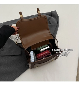 Interior view of the dark brown vintage backpack showing its large storage capacity