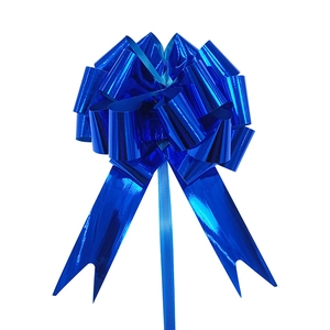 Detailed view of the 3D spherical dark blue gift bow with metallic finish and long tails