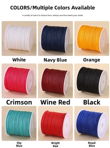 Macro shot of 9 colorful 0.8mm nylon threads on white spools for DIY jewelry making