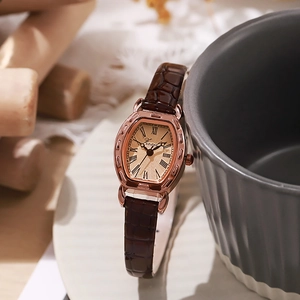 Vintage tonneau rose gold watch for women with champagne dial and brown leather strap