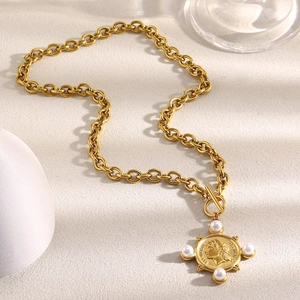 Detail of 18K gold-plated chunky link chain necklace with coin pendant and pearls