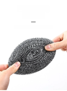 Close-up showing the durable spiral weave and high elasticity of a steel wool scrubber