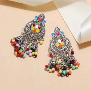 Ethnic silver-toned tassel earrings with colorful enamel hearts and dangling beads
