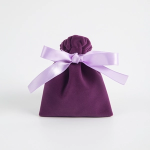 Deep purple velvet jewelry gift pouch featuring a soft light purple satin ribbon drawstring