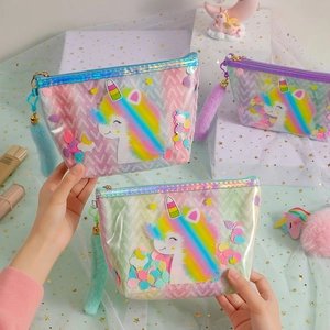 Holographic unicorn makeup bag with plush pompom and shimmering laser finish for girls