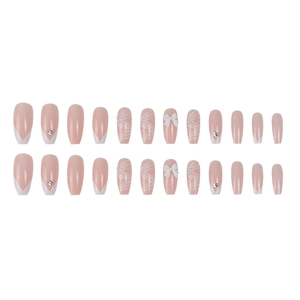 24 faux ongles rose nude avec nœuds papillon, perles et bord blanc à la française