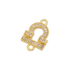 Macro view of gold Libra zodiac connector with inlaid zircons for DIY jewelry making