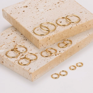 Set of 7 pairs of 18K gold plated stainless steel hoop earrings in various sizes