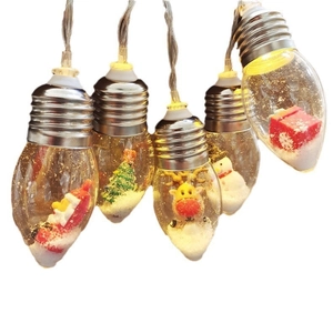 Detailed view of LED Christmas bulbs with miniature Santa Claus and snow-filled interior