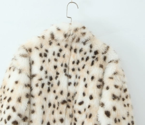 Close-up of leopard print faux fur coat neckline showing plush texture and collar detail