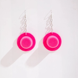 Detailed view of handmade pink flocked mini top hat earrings with silver chain and beads