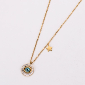Close-up of golden stainless steel necklace with blue evil eye pendant and star charm