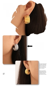 Detail shot of multi-layer textured C-shaped stud earrings in gold and silver finish
