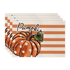 Set of 4 pumpkin harvest table mats with orange and white stripes in faux linen texture