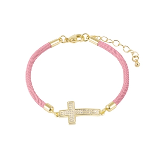 Detailed view of pink woven Milan rope bracelet with micro-pave zircon gold cross charm