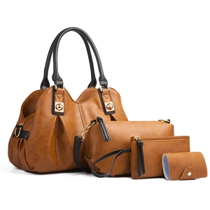 Three-piece brown PU leather vintage tote bag set with shoulder bag and small clutch