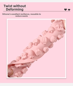 Pink flexible silicone mold showing torsion resistance for DIY fruit candy shapes