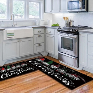 Detail of Christmas gnomes kitchen floor mats set showing festive non-slip flannel surface