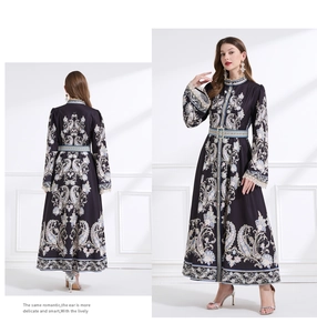 Detail showing vintage court style paisley print on long dress with belt and stand collar