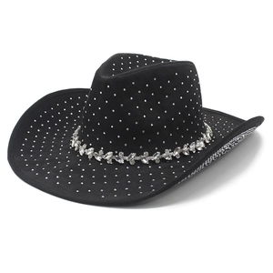 Detail of black cowboy hat featuring sparkling silver rhinestones and ornate crystal band