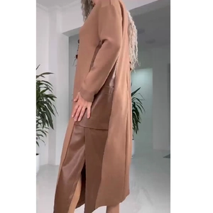 Women's long brown patchwork coat with faux leather panels and large side pockets