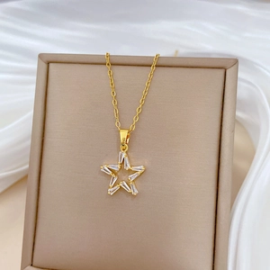 Elegant gold titanium steel necklace featuring a hollow star pendant set with baguette zircons