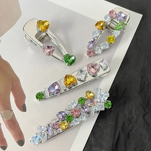 Chic metal hair clips with colorful heart-shaped zircons and geometric crystals