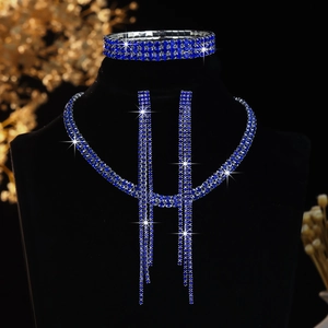 Detail view of blue crystal jewelry set with sparkling choker, bracelet and fringe earrings