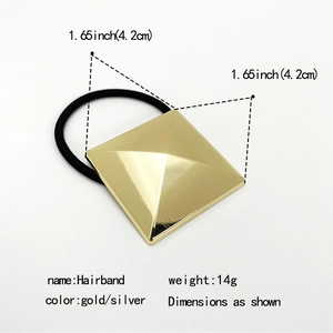 Detail view of a 14g gold pyramid alloy hair tie with measurement 1.65 inch size