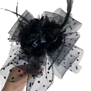 Vintage black polka dot net veil headband with large fabric flower and feather accents