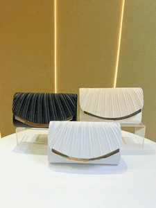 Elegant pleated satin evening clutch bags in black, champagne, and silver with metal trim