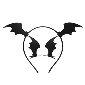 Detailed view of black bat wing headband and hair clips set for Halloween costumes