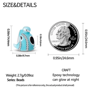 Detailed view of luminous blue oil-drop bead with rhinestones and size measurements