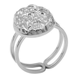 Detailed macro view of silver adjustable ring with hammer-textured lava pattern surface