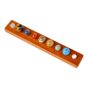 Solar system crystal ball set with nine planets on a wooden base for desk decor