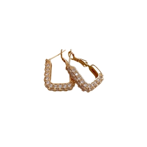 Elegant gold square hoop earrings with sparkling cubic zirconia in a minimalist u-shape design