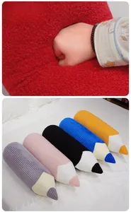 Detail of colorful pencil plush cushions showing soft texture and resilient filling