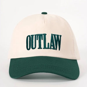 Retro baseball cap in cream and dark green with OUTLAW embroidery and adjustable strap