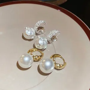 French vintage round pearl earrings in gold and silver finish with crystal inlay