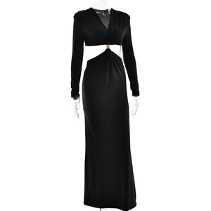 Detail view of the deep V-neckline and waist cutout design on a black slim fit maxi dress