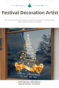 Detail of golden Christmas tree window decal with festive bow and Merry Christmas greeting