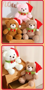 Detailed macro view of plush teddy bears with red Christmas hats and green scarves