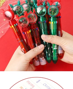 Close-up of Christmas 10-color shuttle pens with reindeer antlers and glitter hearts