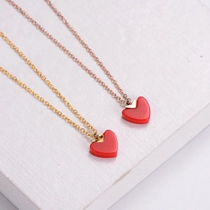 Minimalist red heart pendant necklace in gold and rose gold titanium steel finishes