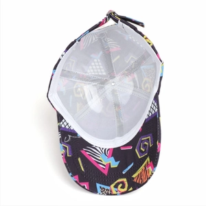 Internal view of a colorful patterned baseball cap showing white mesh lining and sweatband