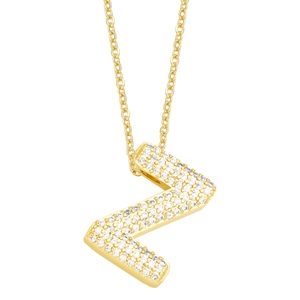Macro detail of gold initial Z pendant necklace featuring sparkling micro-pave zirconia
