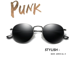 Close-up of retro round metal punk sunglasses featuring black polarized lenses and stylish frames