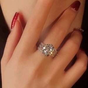 Elegance 5ct moissanite three-row eternity wedding ring on a female model finger