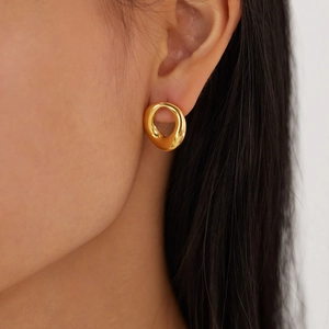 Minimalist gold-plated irregular twisted hoop earrings for women in polished stainless steel